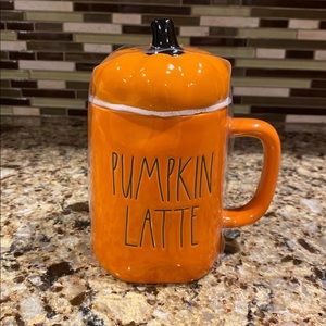 Rae Dunn mug with topper